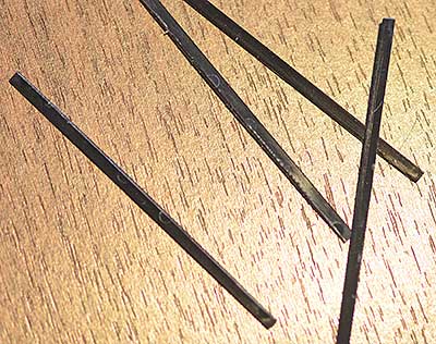 Cut offs Material removed from the Epson Perfection V850 pro film-holder to improve the function and make it more easy to load.