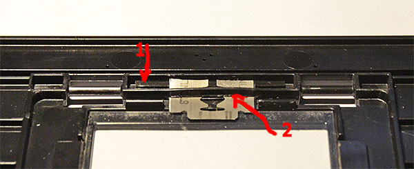 Epson V850 pro razor blade mod How to use a razor blade to improve handling of film in the Epson V850 pro medium format film holder.