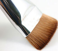 Brush for film dust