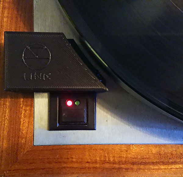 Turntable tachometer enclosure